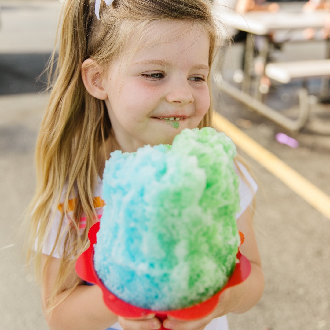 Girl enjoying a snoball